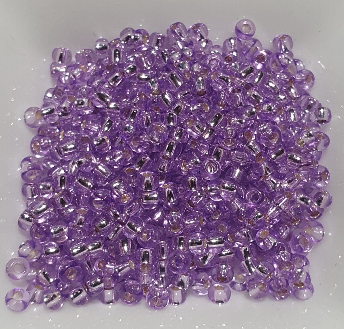 Bunadperler 78223 10/0 Preciosa, lilla, syrin, metallkjerne