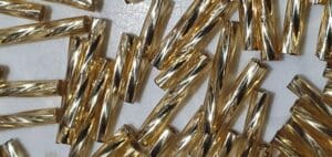 Twist. 12 mm vridde staver, gullfargede