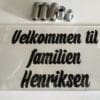 Dørskilt familen Henriksen
